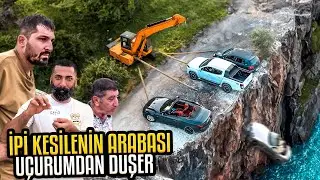 The car of the one whose rope is cut falls down