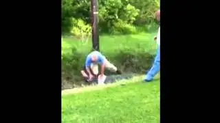 Old man tries to wrestle gator