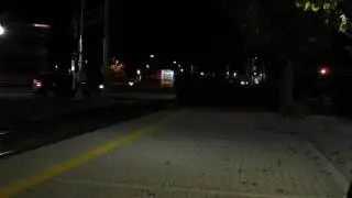 P42DC 182 leads the Amtrak Pere Marquette into Holland Michigan with Veterans NPCU 90221