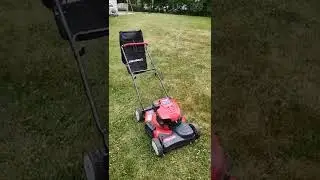 wash one of the mowers.