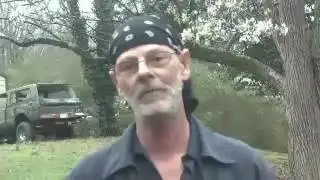 Man found hanging naked, upside down from Mississippi tree