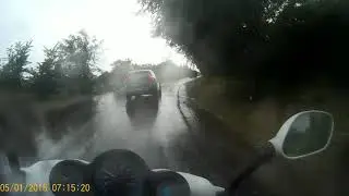 На скутере в дождь