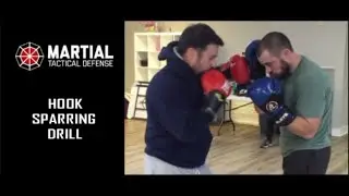Hook punch sparring drill