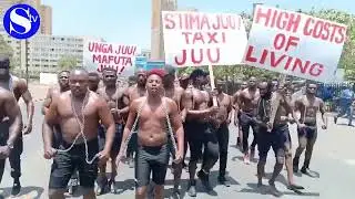 ERIC OMONDI & POLICE OUTSIDE PARLIAMENT BEFORE HIS ARREST
