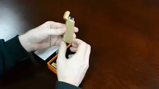 Электроимпульсная зажигалка в подарочной коробке HL 110