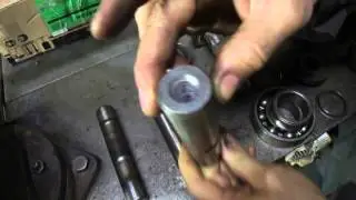 Опорный каток миниэкскаватора