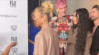 Megan Fox dodges Machine Gun Kelly PDA in tense red carpet video