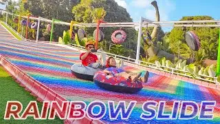 Reihan Naik Rainbow Slide, Perahu Kora Kora, Odong odong Robot di Taman Celosia