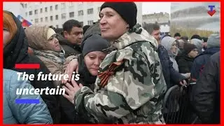 Russian residents bid farewell in tears to mobalised and volunteer soldiers