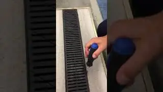 How to remove RELN channel drain grate once installed in concrete