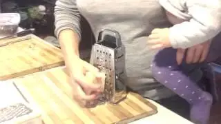Grating Cheese with Baby - non-ergonomic design