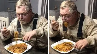 Man Eats Spaghetti With Scissors