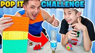 BOTTLE FLIP BATTLE WITH POP IT CHALLENGE
