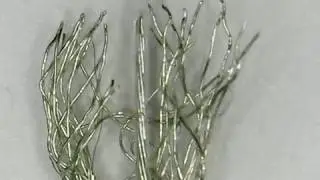 2.4GHz Broken Receiver antenna wire under microscope (FrSky XM+)