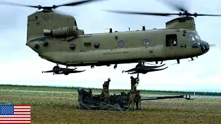 CH-47 Chinook Helicopter to Guerrilla Operate and Sling Load M777 Howitzers