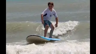 Kids Surfing Lessons catch waves in Daytona Beach, Florida 8-10-24 