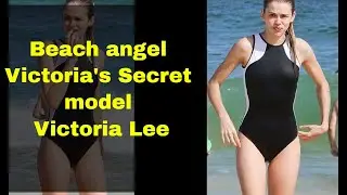 Beach angel Victoria's Secret model Victoria Lee cuts a casual figure in slimline swimsuit as she ca