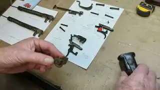 Taking a soft focus peek at the innards of a Daisy Model 21 Double Barrel BB gun. Loads of fun!