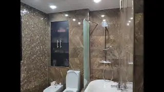 Стеклянная шторка на ванну