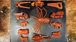 membersihkan mainan belumpur sapi,gergaji,dump truck,laba-laba,truck molen,gajah,keret a api.
