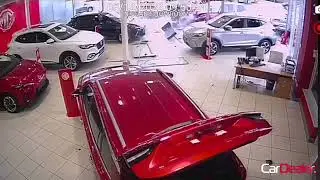 Car smashes into Sandicliffe MG car dealership