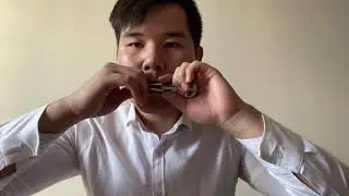 Хомуска тардыы/Игра на варгане хомус