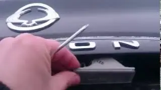 Замена ламп подсветки номерного знака.Ssang Yong Actyon New...