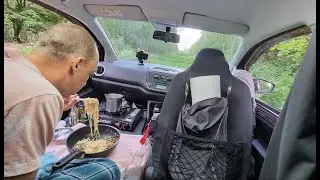 solo camping and cooking in my car