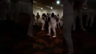 Drunk African man dancing at party