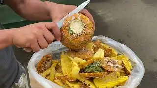 Easy way of peeling pineapple #shorts