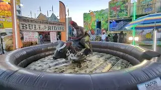 Simbi riding that Bull at the Perry GA Fair, 2024