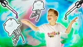 Experiments for children. Drawing on milk