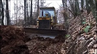 Bulldozer repair forest road