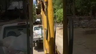 Ford Ranger on the “tow truck” so many uses for a backhoe. #johndeere #heavyequipment #ford