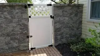 Backyard privacy retaining wall & gate installation in Hanover, PA - Ryan's Landscaping