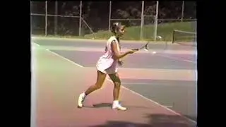 Kim and Julie Playing Tennis