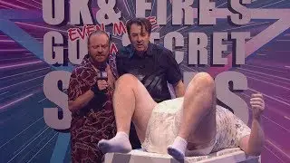 Jonathan Ross changes a nappy