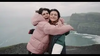 Happy Two Ladies Arrived on Amazing Place | Stock Footage - Videohive