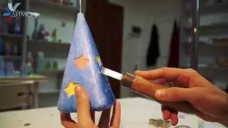 CARVING CANDLE WITH TRIANGULAR BASIS FROM THE CANDLE OF WORKSHOP DIMSI