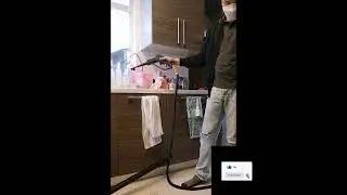 Demonstration on how to clean the floor tiles using the machine.