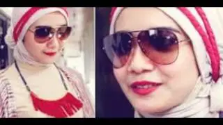 wanita muslimah berkacamata