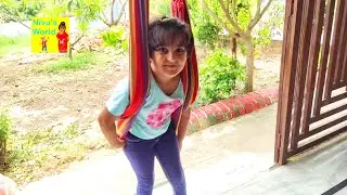 Kid Swinging on Swing Set! Nivu On a Swing at home! Kids Swing Kids Games!