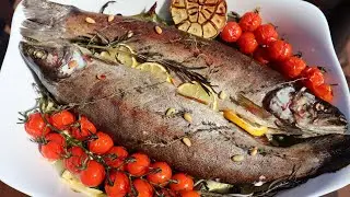Tray baked trout on the vegetables in the oven | Healthy Nutrition