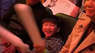 Kid cheering at OWL match