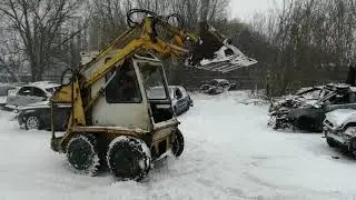 Работа минипогрузчика  мумс 11