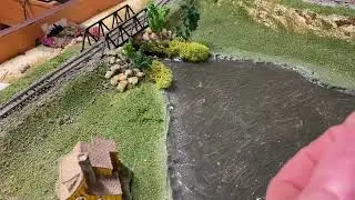 Installing trees and foliage to the layout.