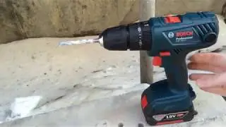 Hammer drill Bosch GSB 18V-21 vs curbstone