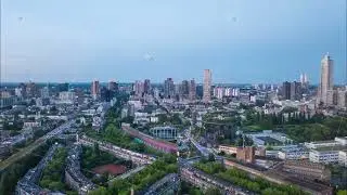 Hyperlapse of Rotterdam dynamic cityscape from above, highlighting its modern architecture and