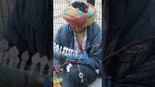 Folk instrument performer at Manali