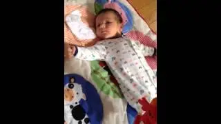 Cole on playmat- 2 weeks